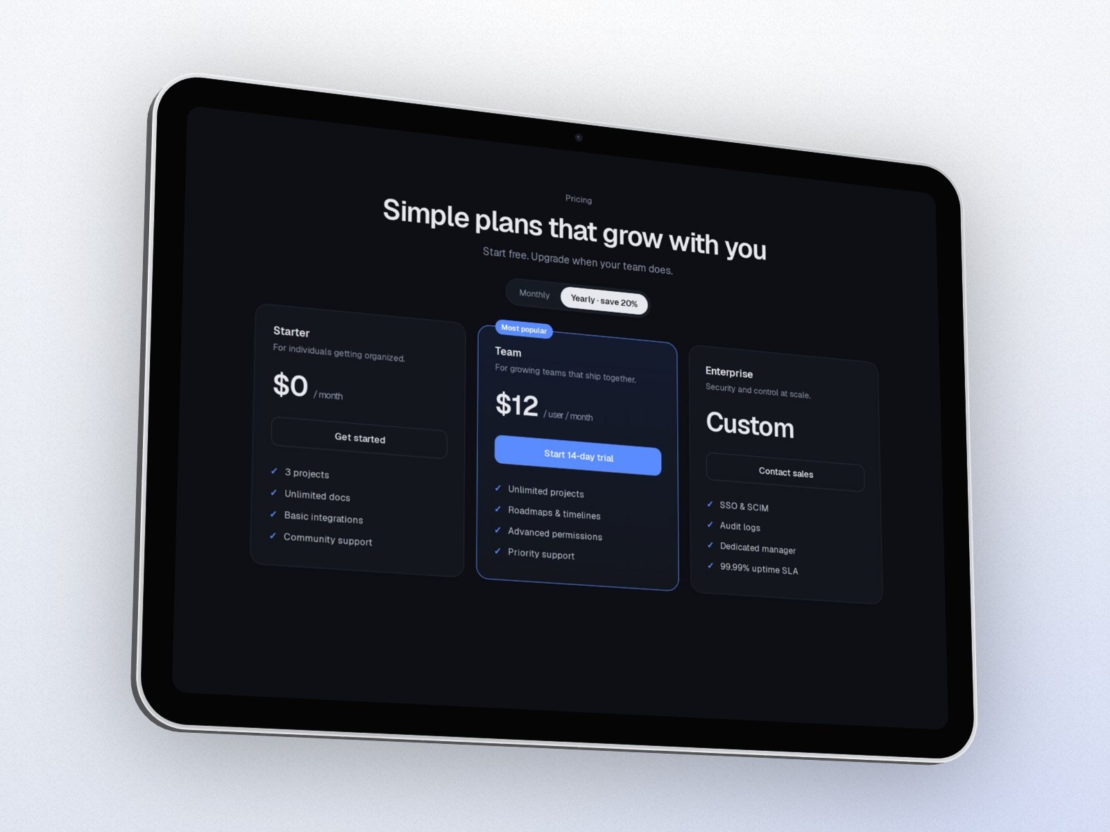 A pricing page in a silver 3D iPad on a light background